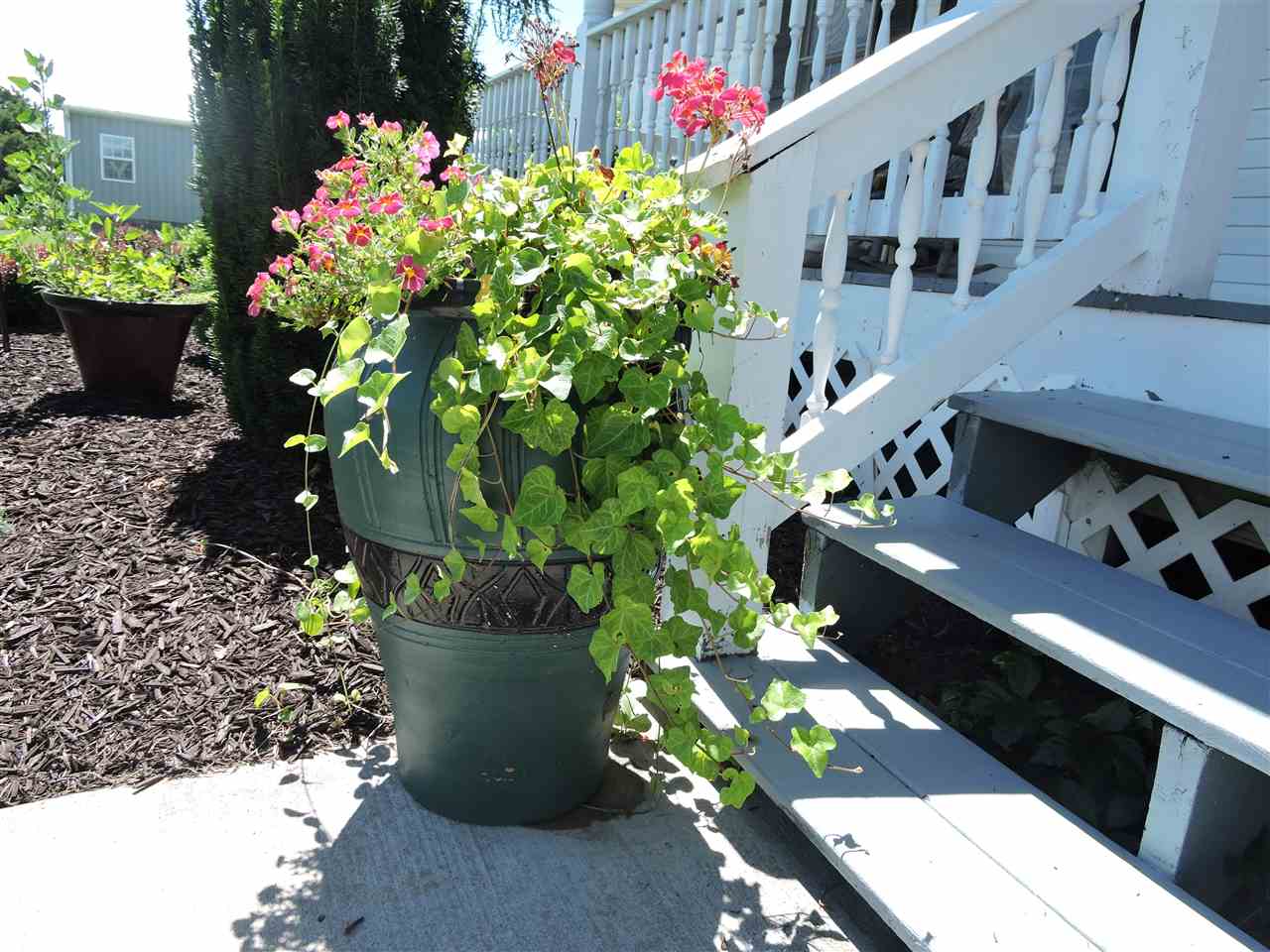 123 Cricket Road Staunton, VA 24401 - Photo 10 of 49 a view of a house with a flower garden