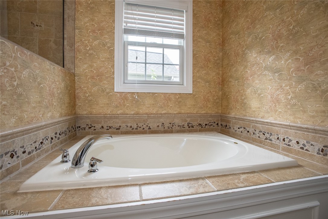 630 Rundle Street Lagrange, OH 44050 - Photo 21 of 49 Full bathroom with wallpapered walls and a bath