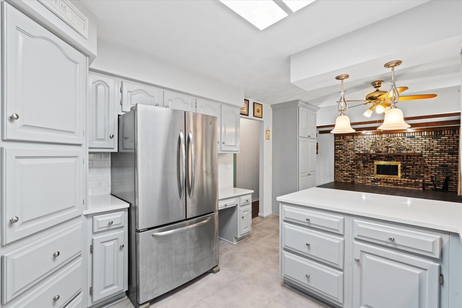 10 Oak Grove Road Geneseo, IL 61254 - Photo 11 of 43 a kitchen with cabinets and stainless steel appliances