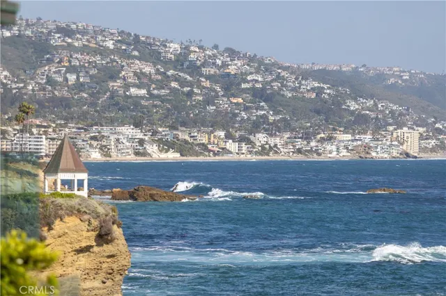 a view of a swimming pool with an outdoor space and seating area