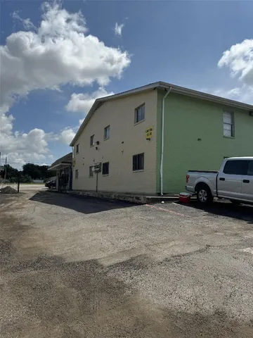 a view of a car in front of a house