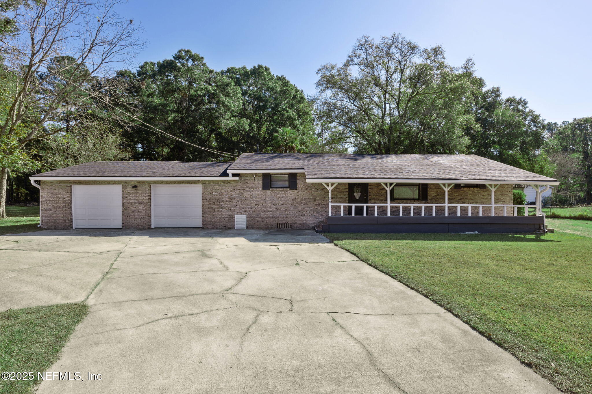 44186 Lee Drive Callahan, FL 32011 - Photo 1 of 28 a view of house with outdoor space area