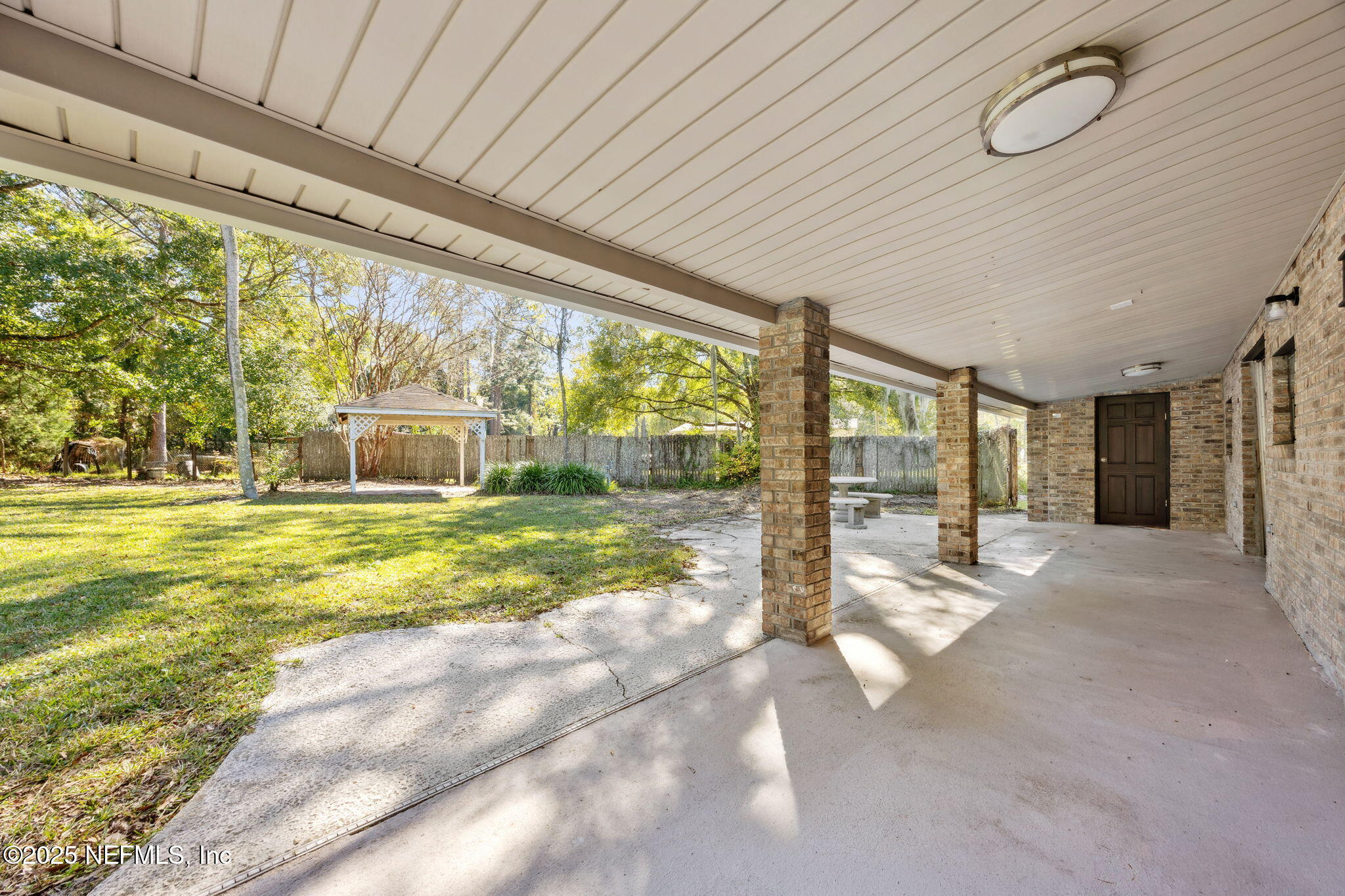 44186 Lee Drive Callahan, FL 32011 - Photo 19 of 28 a view of a house with a backyard
