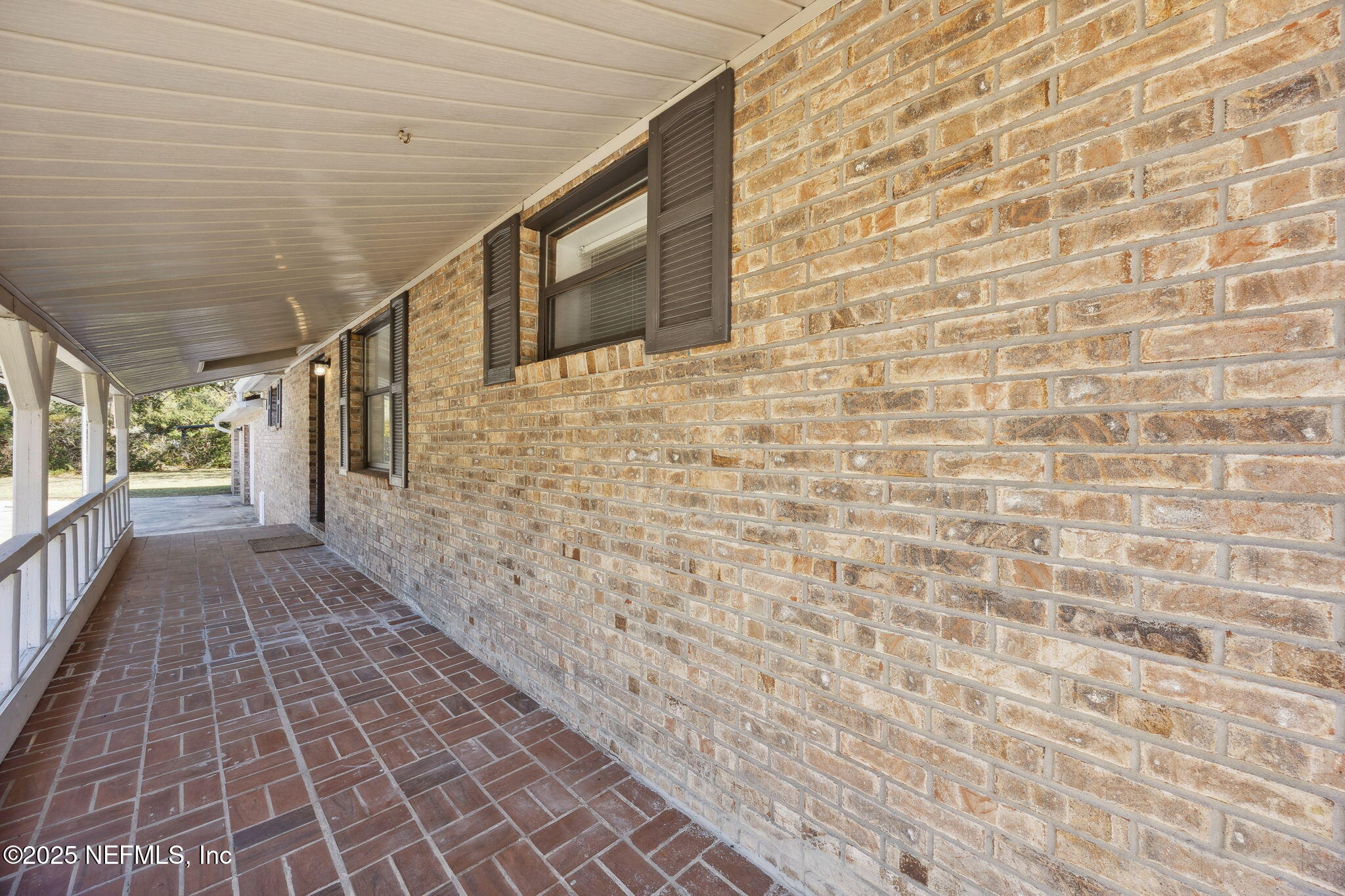 44186 Lee Drive Callahan, FL 32011 - Photo 2 of 28 a view of a pathway both side of building