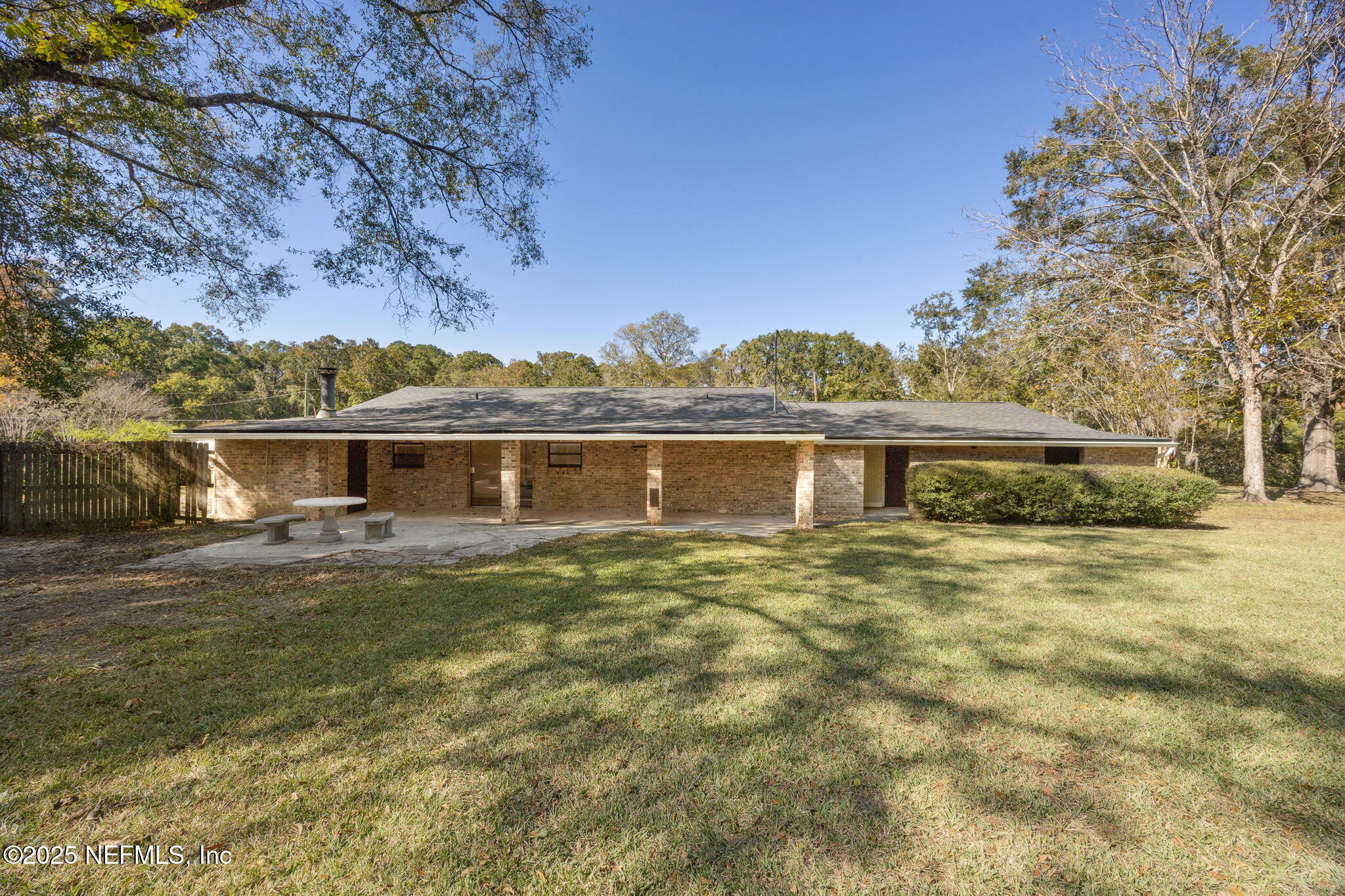 44186 Lee Drive Callahan, FL 32011 - Photo 22 of 28 a front view of a house with a garden