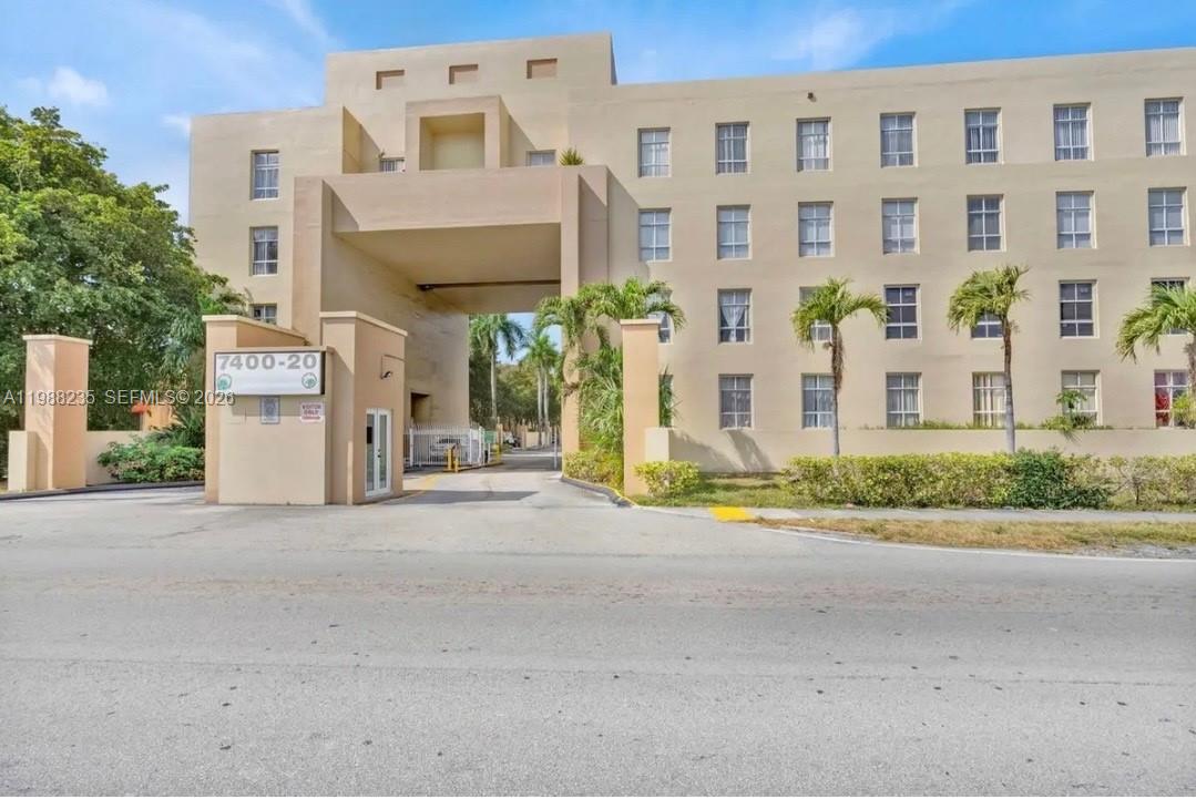 7420 West 20th Avenue, Unit 243 Hialeah, FL 33016 - Photo 1 of 9 front view of a building with a street