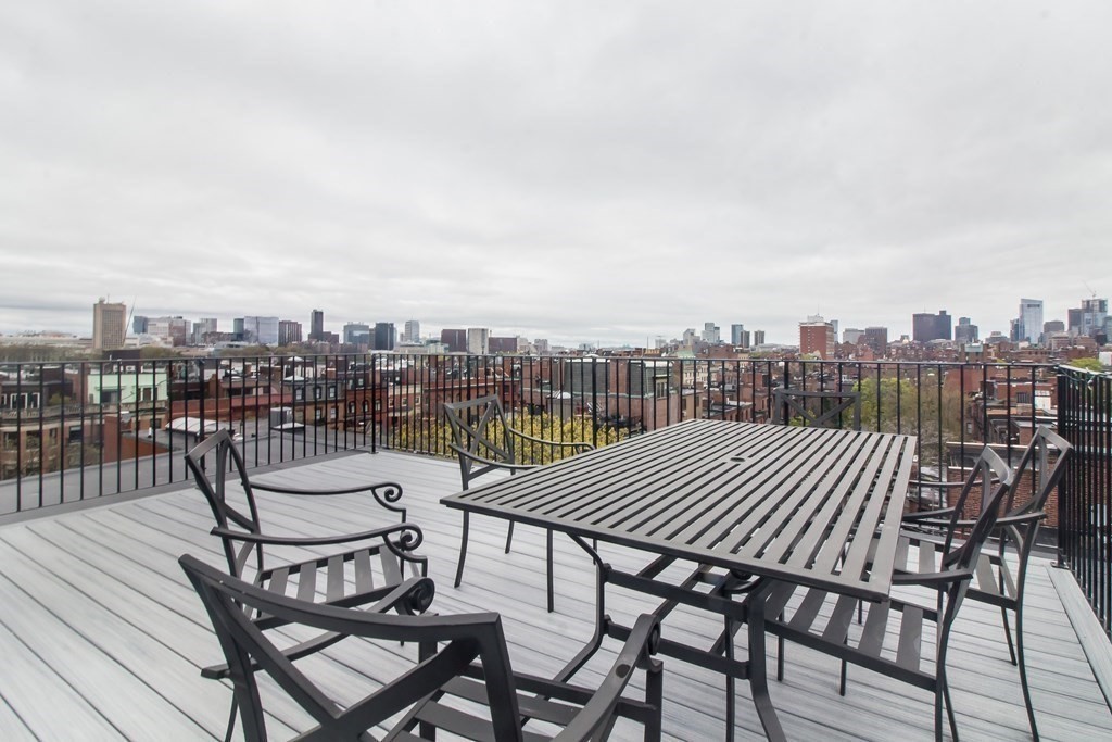 405 Marlborough Street, Unit 41 Boston, MA 02115 - Photo 25 of 32 a view of a terrace with furniture