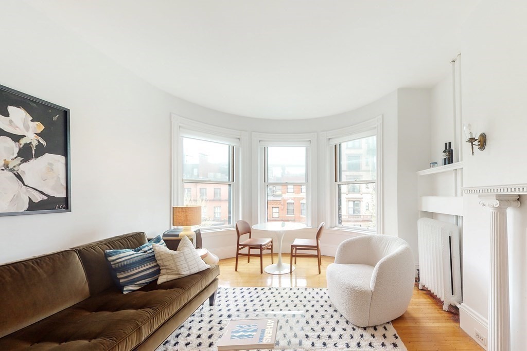 405 Marlborough Street, Unit 41 Boston, MA 02115 - Photo 6 of 32 a living room with furniture and a couch