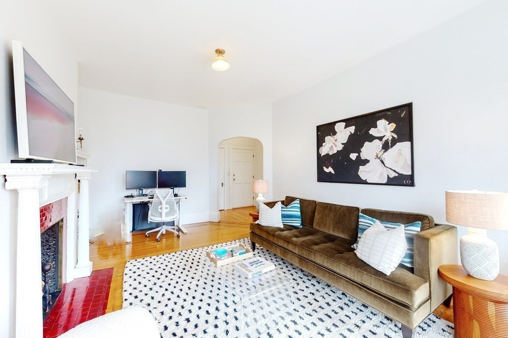 405 Marlborough Street, Unit 41 Boston, MA 02115 - Photo 8 of 32 a living room with furniture and a couch