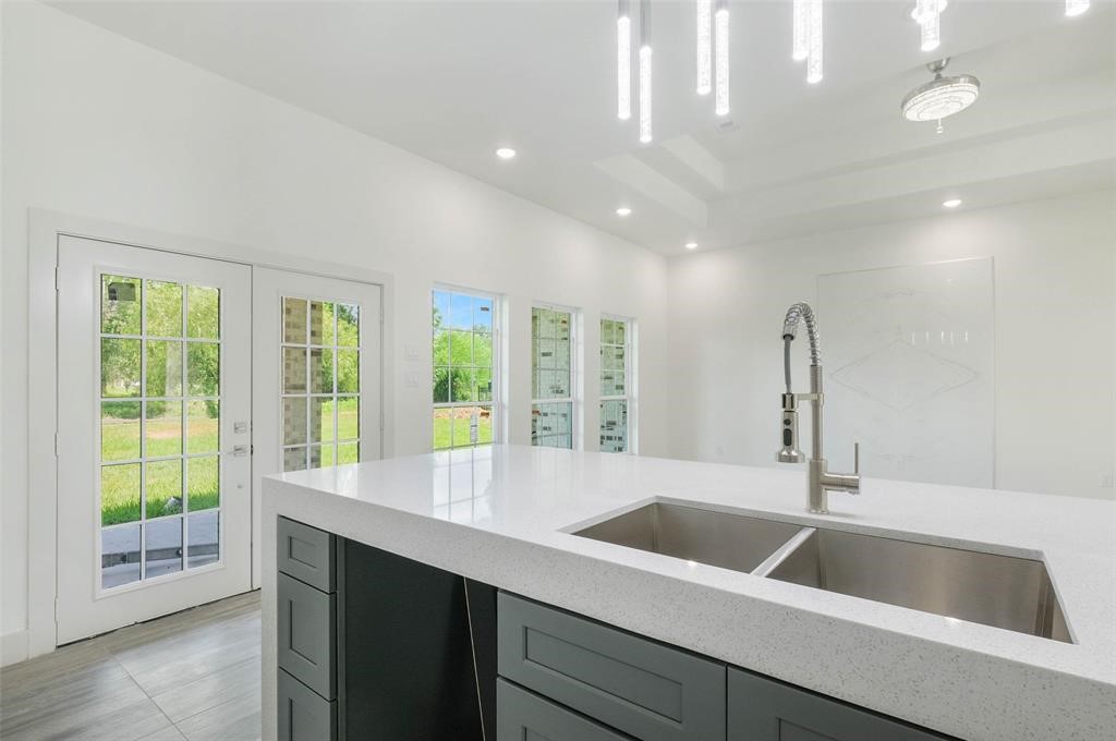 2291 Riverside Drive West Columbia, TX 77486 - Photo 27 of 50 a view with a sink a counter top space and windows in a room