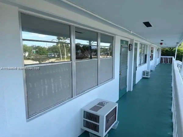 a room with furniture and a window
