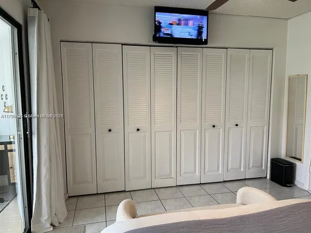 a view of a livingroom with wooden floor