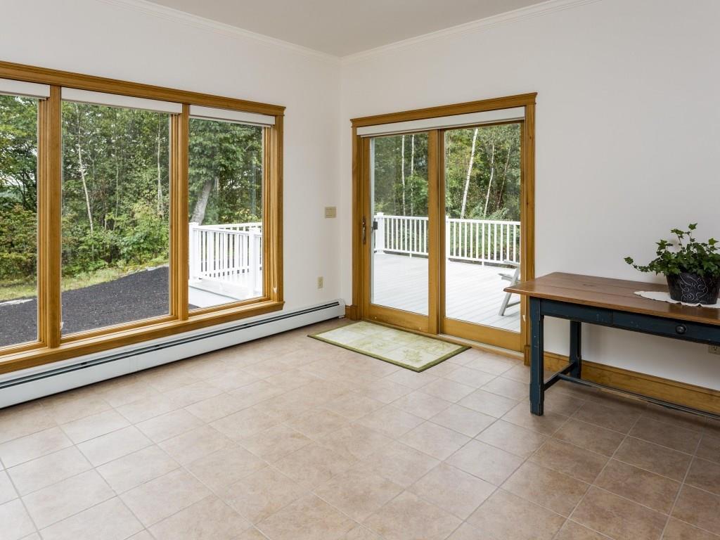 43 Pasture Lane Boothbay, ME 04571 - Photo 14 of 35 The four season room with tile floor