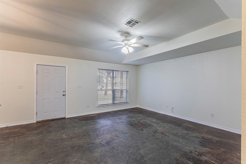 1923 South 15th Street Waco, TX 76706 - Photo 2 of 16 a view of an empty room with a window