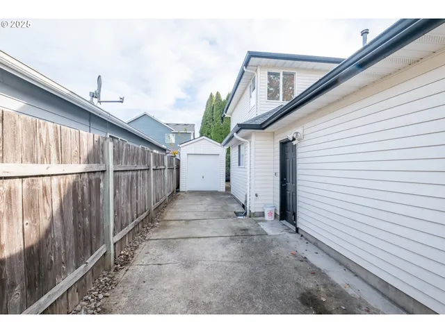 a view of a house with wooden stairs