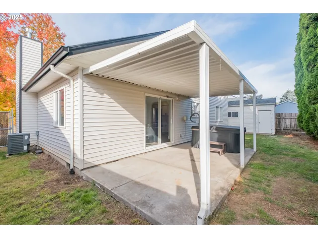 a view of house with patio