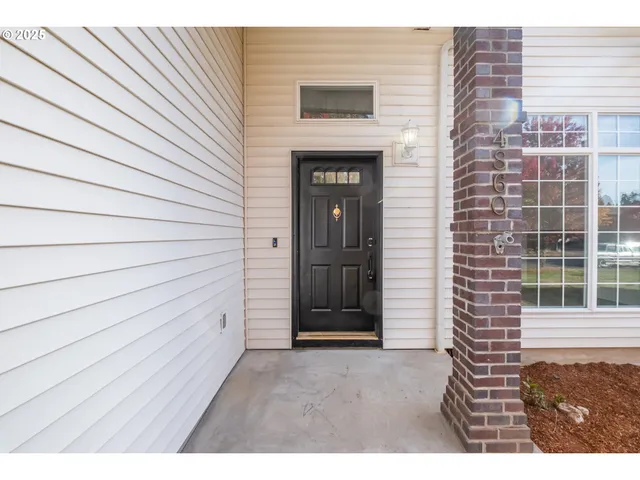 a view of outdoor space and front view of a house
