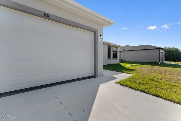 $1,990 | 1134 Cummings Street East, Lehigh Acres, FL 33974