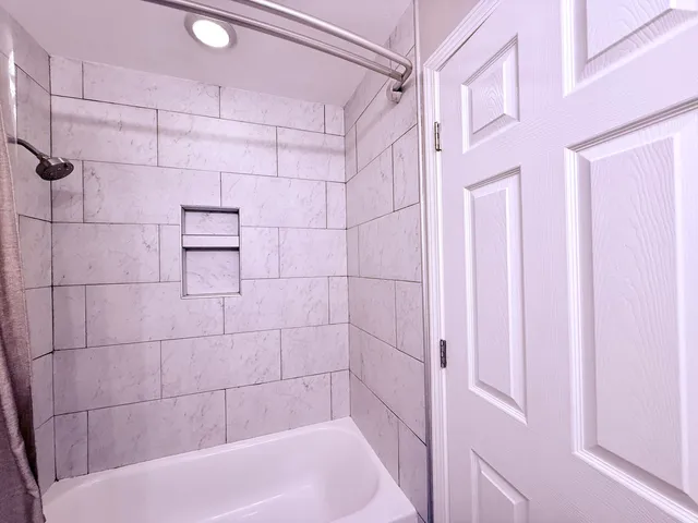 a bathroom with a bathtub