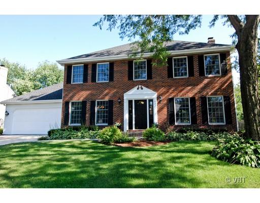 1915 Fairfax Road St. Charles, IL 60174 - Photo 1 of 1 a front view of a house with a yard and trees