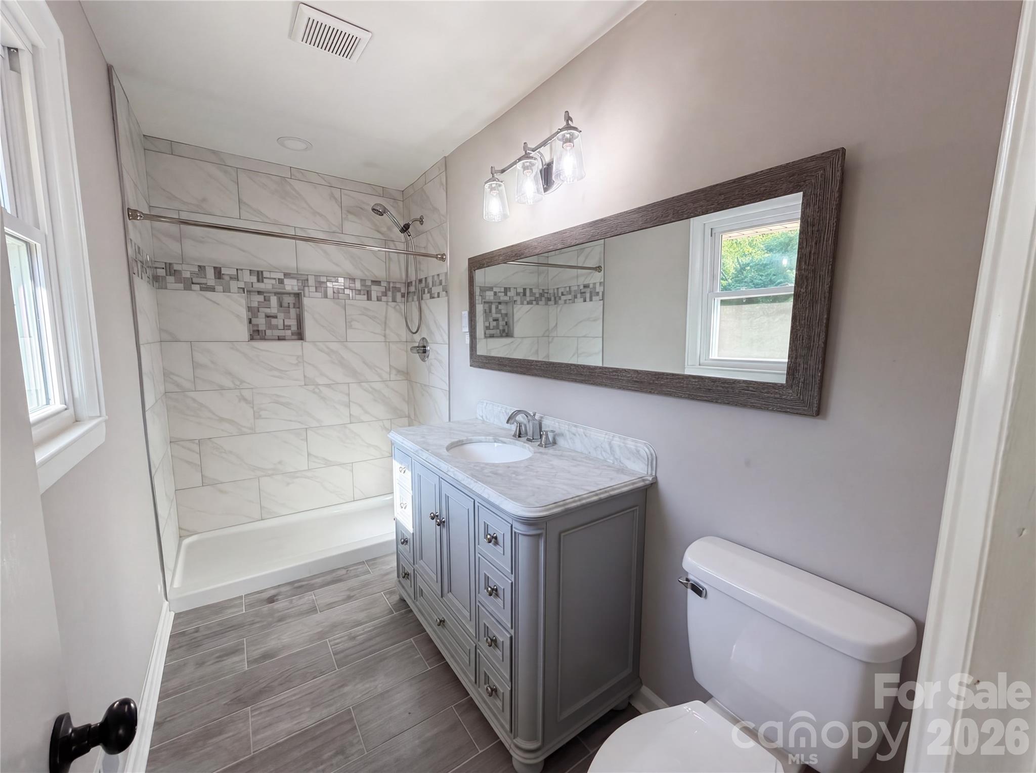 2375 Saw Road China Grove, NC 28023 - Photo 12 of 18 a bathroom with a sink toilet and shower
