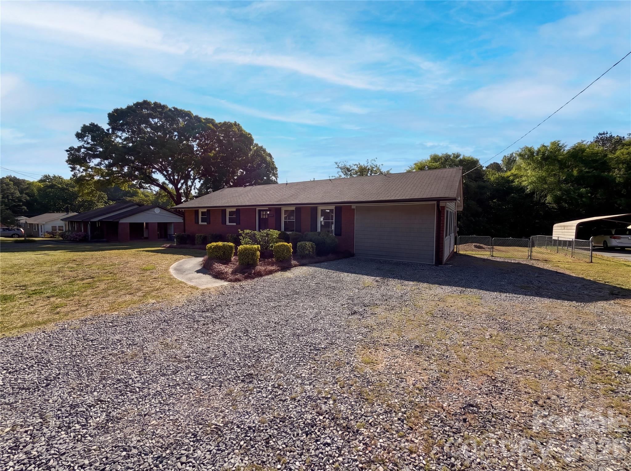 2375 Saw Road China Grove, NC 28023 - Photo 2 of 18 a view of a house with a yard and sitting area
