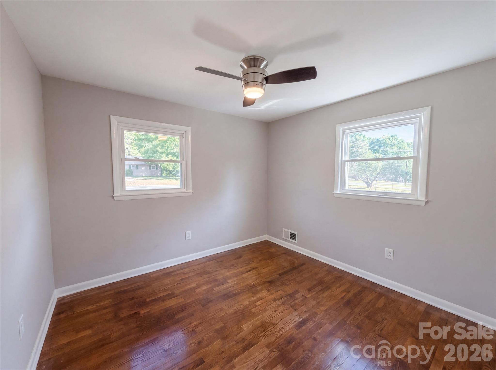 2375 Saw Road China Grove, NC 28023 - Photo 9 of 18 a view of empty room with wooden floor and fan