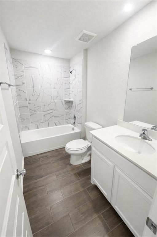6609 Adderly Road Pilot Point, TX 76258 - Photo 11 of 15 a bathroom with a bathtub sink mirror and toilet