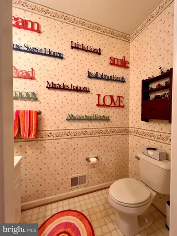 a bedroom with a bed furniture and a window