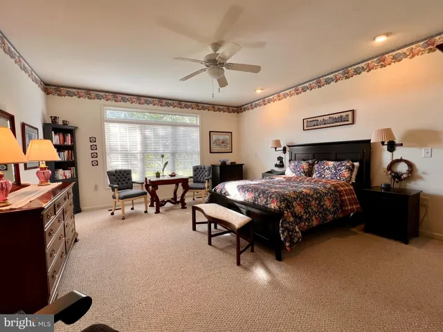 a room with furniture and a flat screen tv