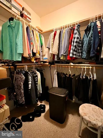 a workspace with furniture hardwood and a window