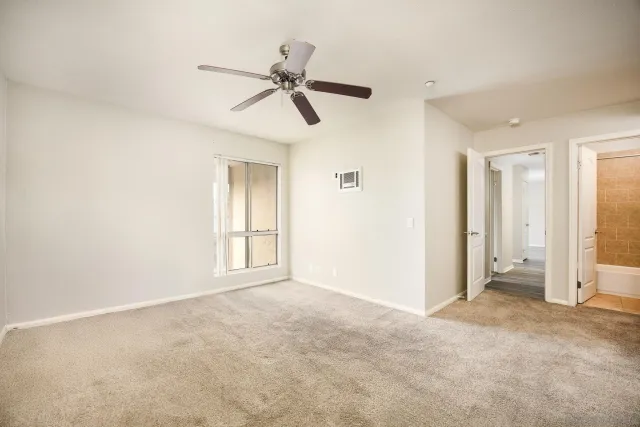 a view of an empty room and window