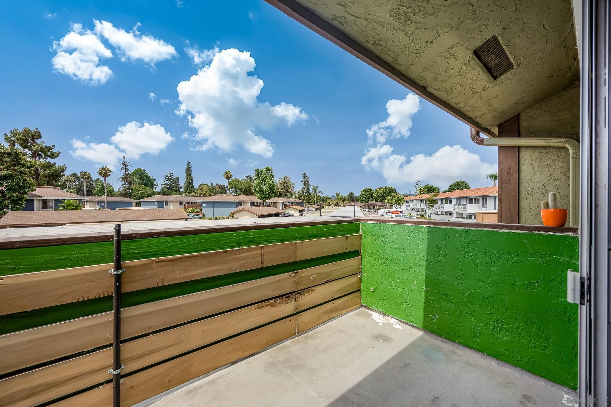 615 Fredricks Avenue, Unit 134 Oceanside, CA 92058 - Photo 25 of 40 a view of a big yard with potted plants