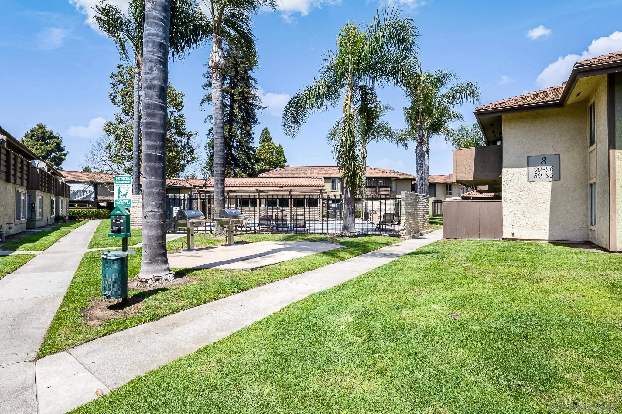 615 Fredricks Avenue, Unit 134 Oceanside, CA 92058 - Photo 31 of 40 a view of a house with swimming pool and furniture