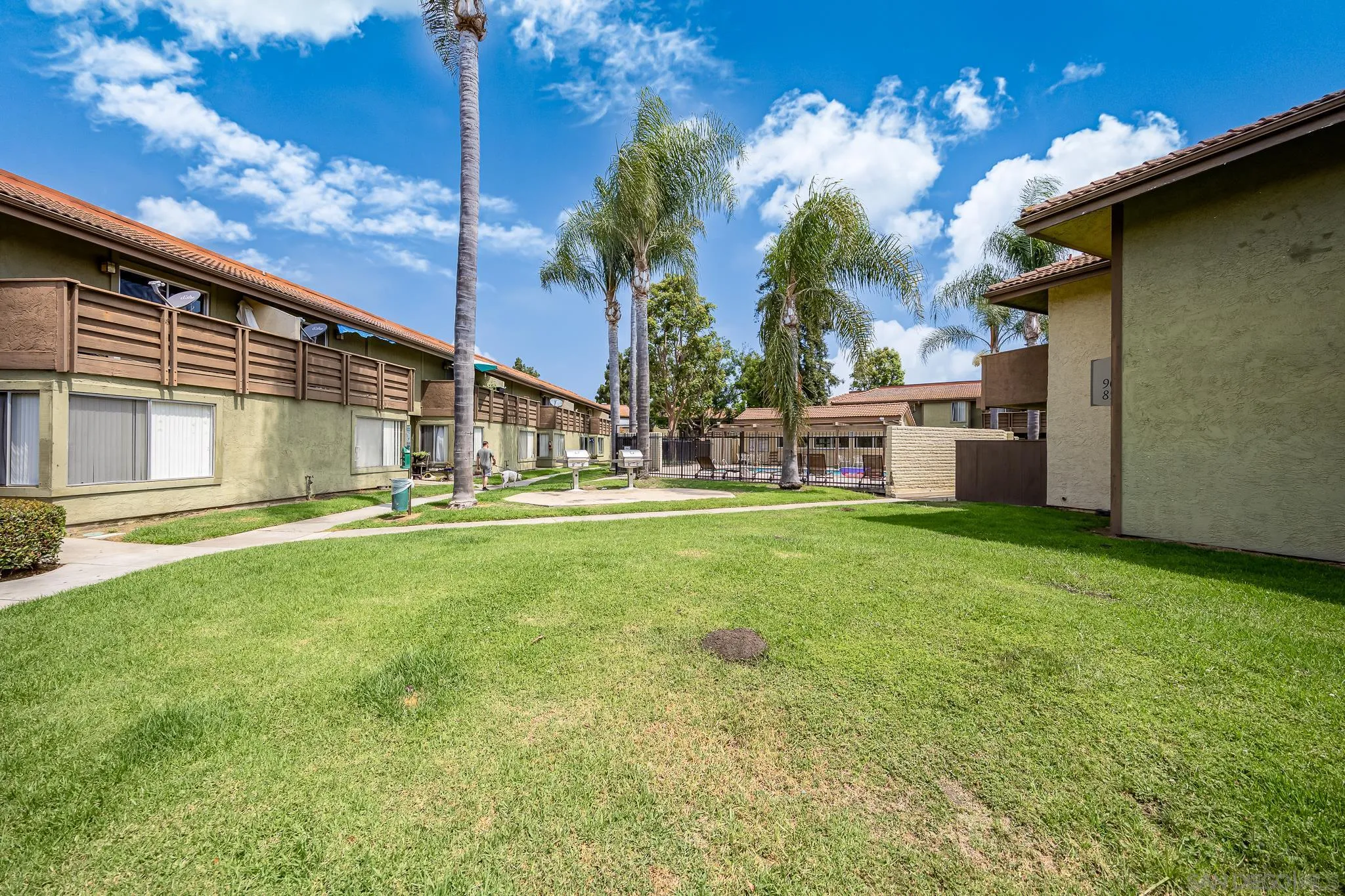 615 Fredricks Avenue, Unit 134 Oceanside, CA 92058 - Photo 33 of 40 a view of a house with a yard