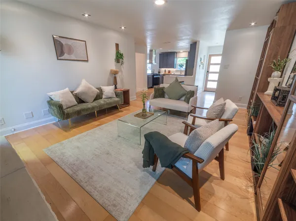 a kitchen with a table and chairs in it