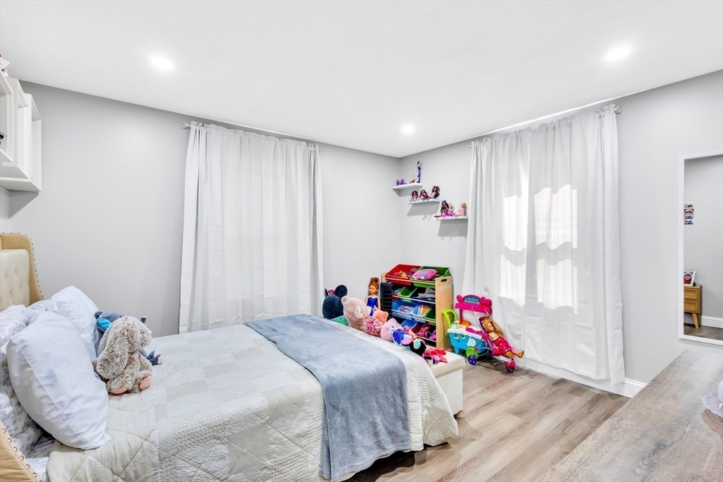 306 Berlin Road Marlborough, MA 01752 - Photo 14 of 36 a bedroom with a bed and a window