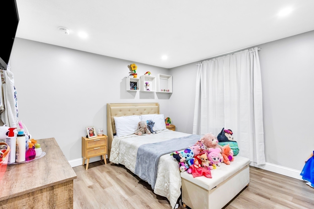 306 Berlin Road Marlborough, MA 01752 - Photo 16 of 36 a bedroom with a bed and a window