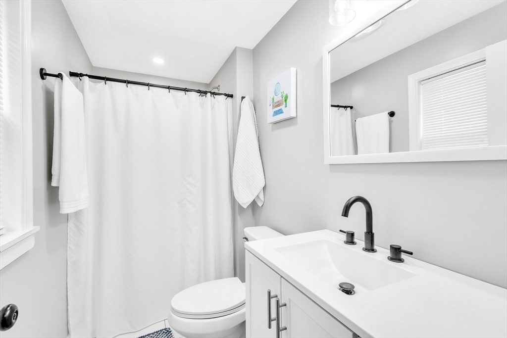 306 Berlin Road Marlborough, MA 01752 - Photo 20 of 36 a bathroom with a sink toilet and shower