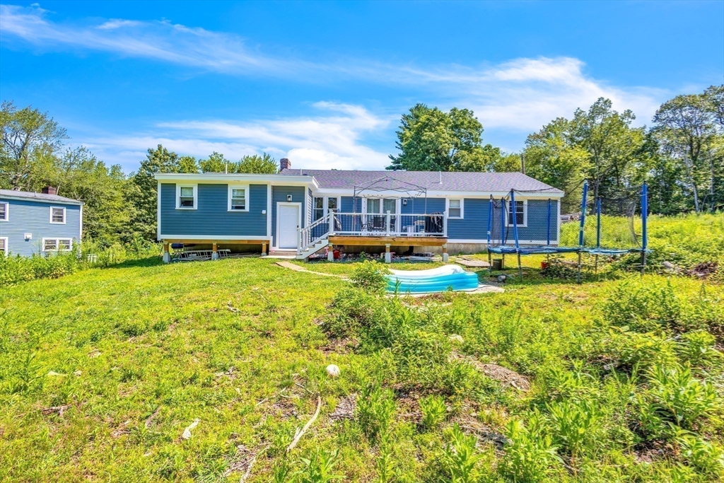 306 Berlin Road Marlborough, MA 01752 - Photo 35 of 36 a view of a house with a big yard