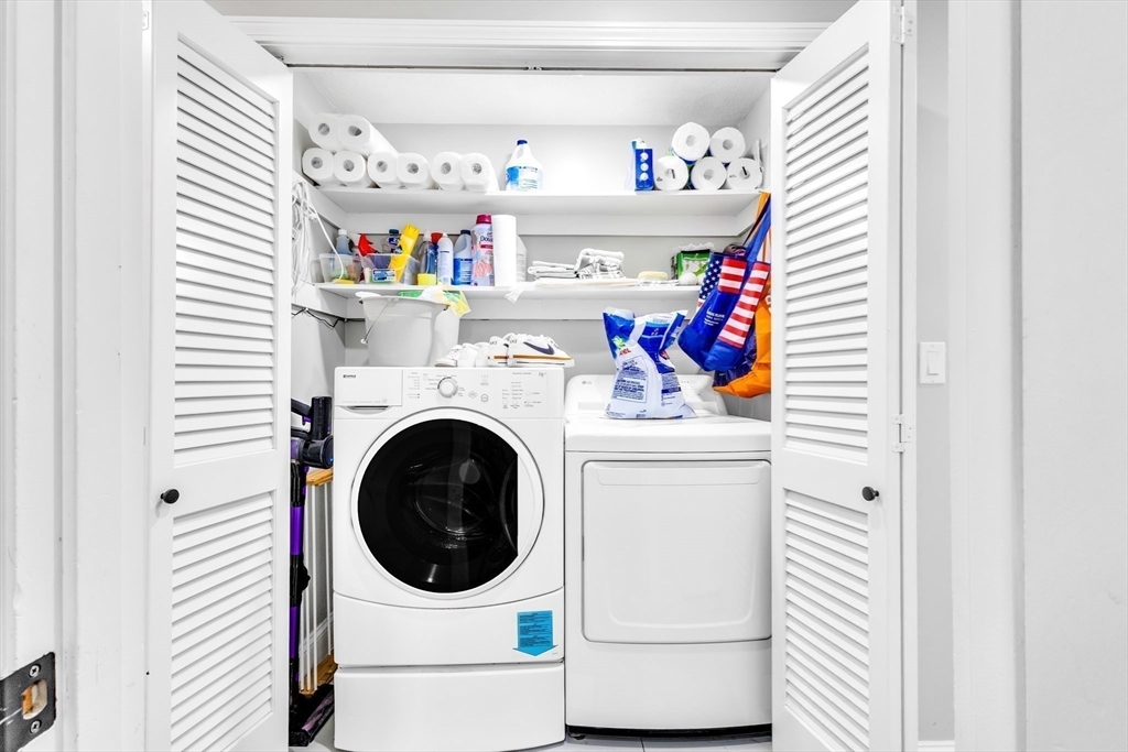 306 Berlin Road Marlborough, MA 01752 - Photo 10 of 36 a utility room with dryer and washer