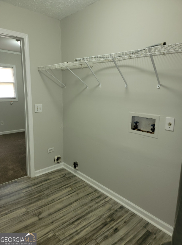 15 Greenview Drive McDonough, GA 30253 - Photo 15 of 26 a view of a room with wooden floor and bench