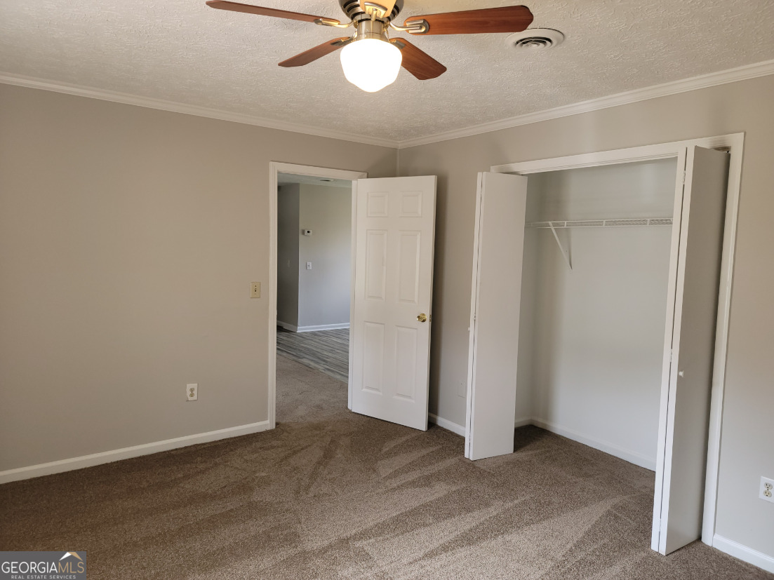 15 Greenview Drive McDonough, GA 30253 - Photo 17 of 26 wooden floor in an empty room
