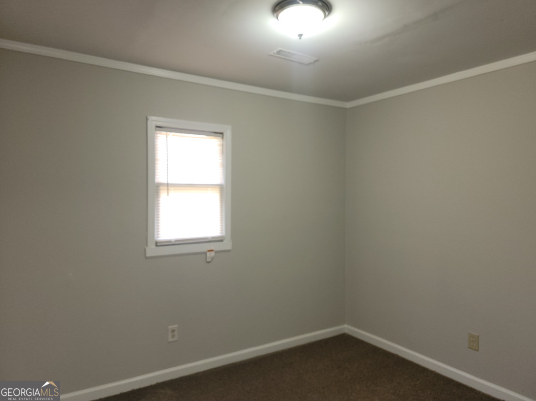 15 Greenview Drive McDonough, GA 30253 - Photo 20 of 26 an empty room with a window