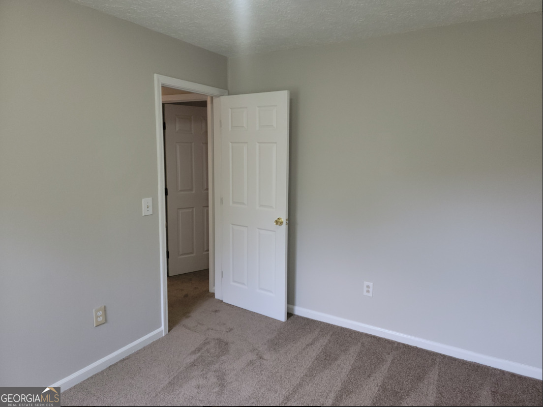 15 Greenview Drive McDonough, GA 30253 - Photo 23 of 26 an empty room with closet