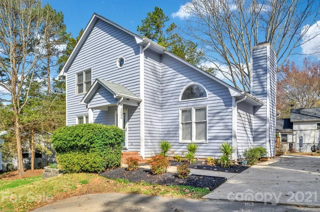 3080 Point Clear Drive Tega Cay, SC 29708 - Photo 1 of 23 a front view of a house with a yard