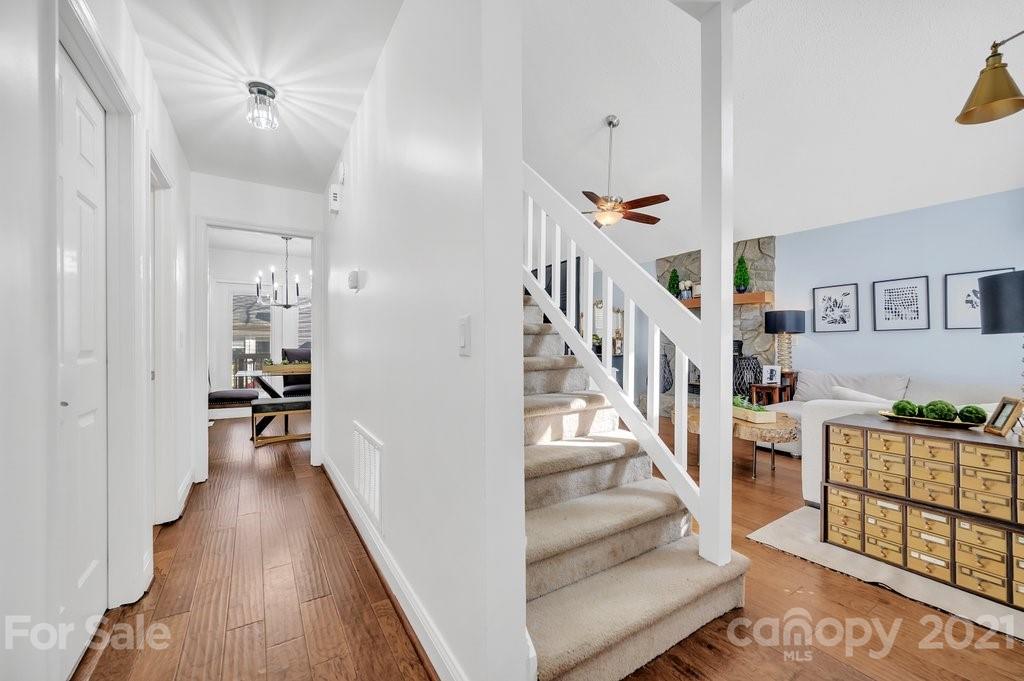 3080 Point Clear Drive Tega Cay, SC 29708 - Photo 18 of 23 a view of entryway and hall with wooden floor