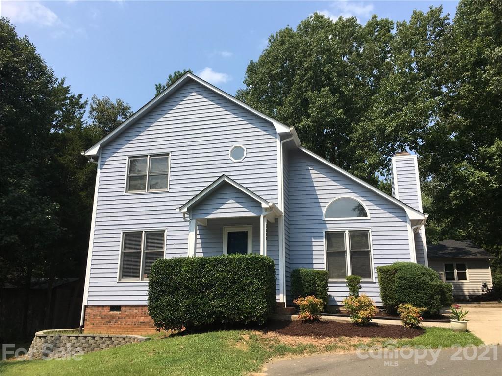 3080 Point Clear Drive Tega Cay, SC 29708 - Photo 21 of 23 a front view of a house with a yard