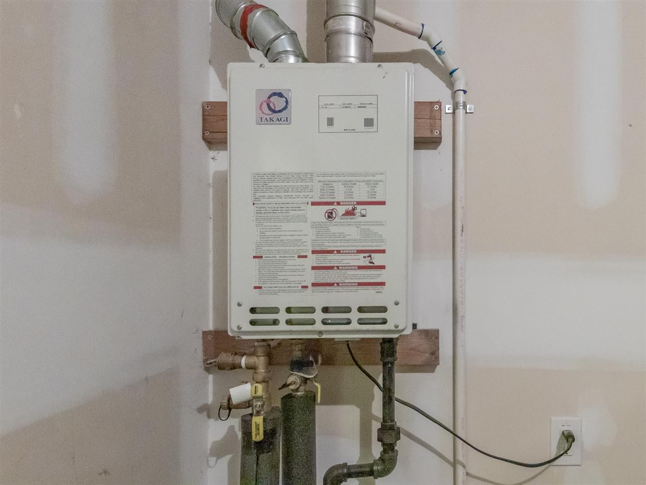 604 Smith Ridge Way Fuquay-Varina, NC 27526 - Photo 19 of 30 Tankless Water Heater