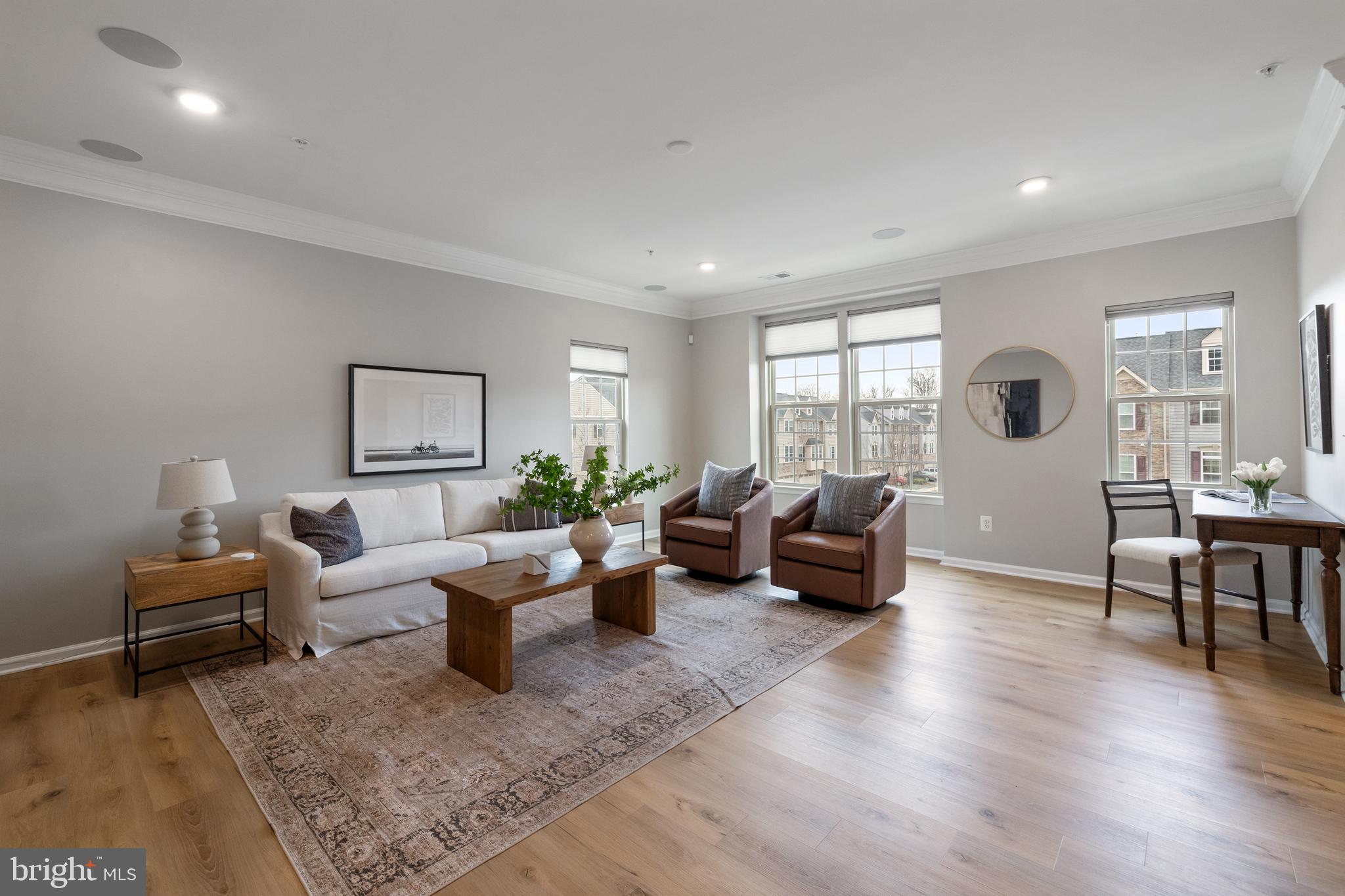 13635 Rockingham Lane Gainesville, VA 20155 - Photo 7 of 56 a living room with furniture and wooden floor